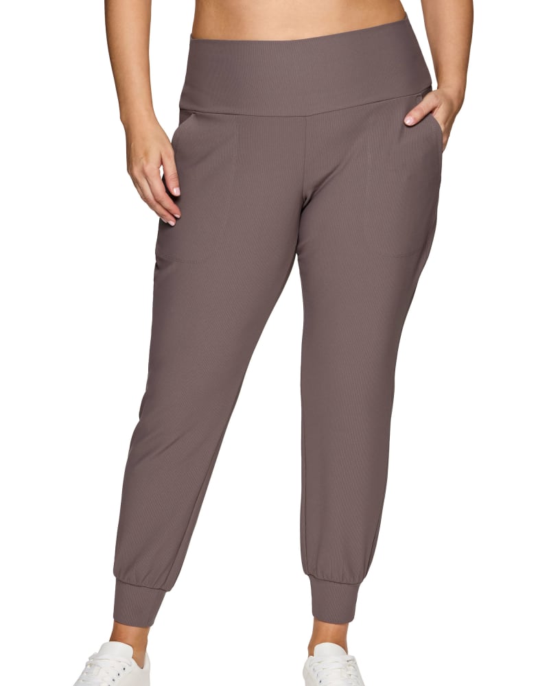 Front of a model wearing a size 1X Plus Sunday Reset Jogger in Walnut by RBX Active. | dia_product_style_image_id:328720